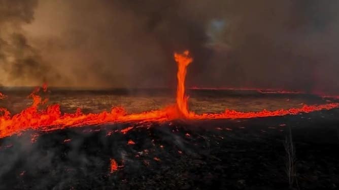 Fire while whips through burning field in Iowa on April 17, 2025.